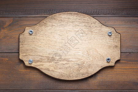 木板壁背景纹理上的名牌高清图片下载-正版图片305754339-摄图网