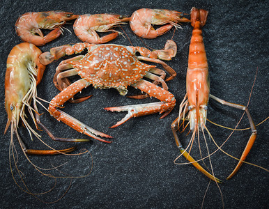 海产食品板和虾螃蟹海晚餐美食深底煮熟的贝壳鱼图片
