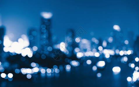 市中心摩天大楼的布基背景城市有灯光夜里布卢利照片城市风景亮图片