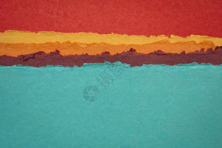 抽象的地貌景观由回收的棉布制成多彩色手工印地安人纸图片