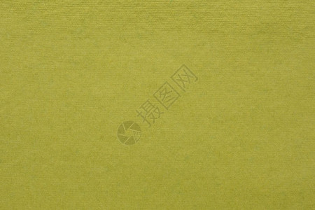 由回收的棉花纤维制成橄榄绿色手工制印地安纸的背景和纹理图片