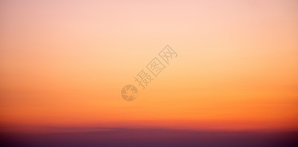 橙色的日落天空背景图片