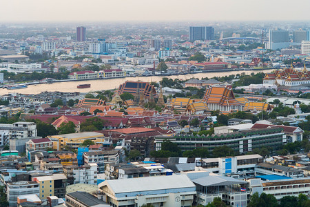 WatPho或WatChetuphonVimolmangklararmRajwaramahaviharn的空中景象泰国曼谷市日落图片