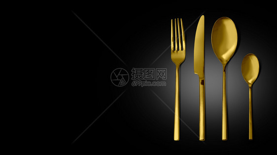 配有叉子刀和勺隔离的金餐具有剪切路径图片