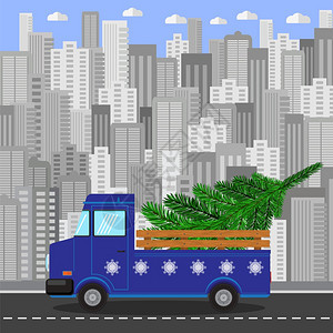 蓝色圣诞卡车有绿箭灰色城市建筑背景蓝色圣诞卡车有灰色城市建筑背景图片