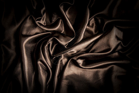黑色丝绸织物涂着美丽的折叠纸黑色织物图片