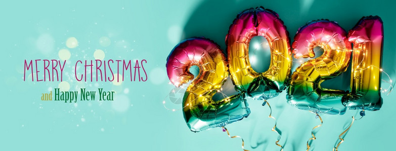 彩虹色Foil气球形式为201年蓝背景和文字圣诞和新年快乐庆祝活动图片