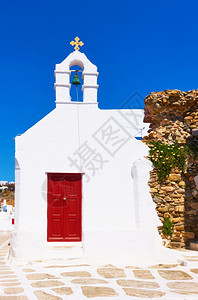 希腊Mykonos镇Chora古老的街道有白色古希腊老教堂Chora图片