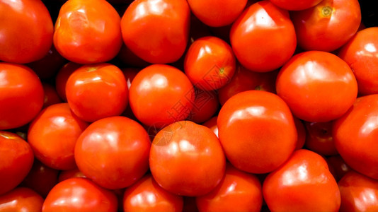 许多新鲜的成熟西红柿近照鲜熟蔬菜的口味或模式鲜熟蔬菜的口味或模式图片