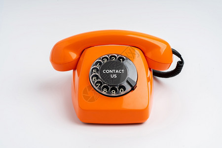 呼叫中心虚拟和复古电话概念图片