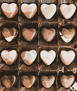 节日盒中的心形巧克力图片