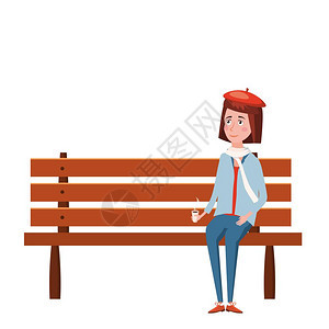 秋天快乐的女孩坐在长椅上喝咖啡图片