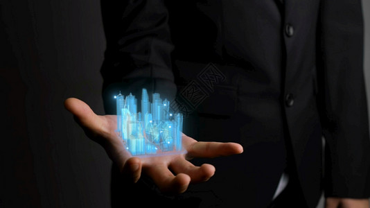 商业家拥有3D城市模型显示现实技术在不断增强未来城市全息图屏幕在虚拟事物互联网和全球络连接的概念中出现图片