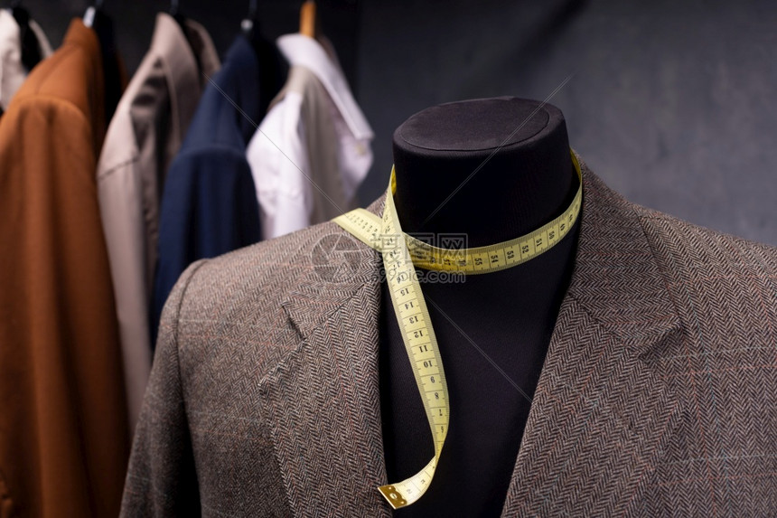 男裁缝制衣模特的外套服装饰的创造概念图片