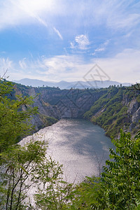 GrandChonburi峡谷煤矿开采或在山丘石场用黑块开采矿工厂自然景观背环境资源图片