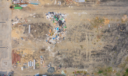 从空中查看各种垃圾堆塑料袋和工业厂垃圾堆点的环境污染垃圾倾倒场的废物处理图片