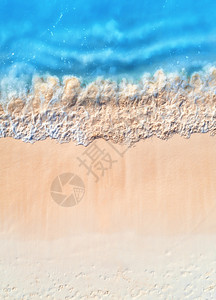清蓝海的空中景象浪和日落时空白沙滩非洲桑给巴尔夏季热带风景白沙和凉水海洋顶层风景自然背图片