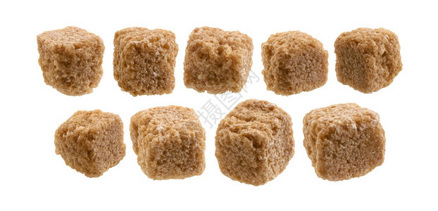 一组棕色甘蔗糖孤立在白色背景上一组褐色甘蔗糖孤立在白色背景上图片