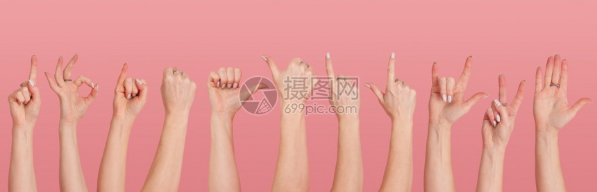 女手在各种场合的几不同手势使粉红色背景的近身更接粉红色背景图片