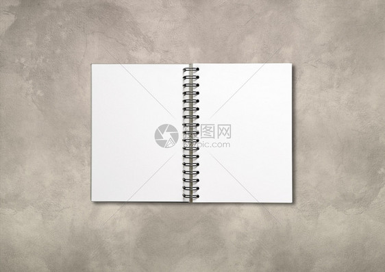在混凝土背景上孤立的空白开放螺旋笔记本模型在混凝土背景上孤立的空白开放螺旋笔记本图片
