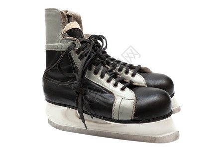 白色背景的旧黑冰鞋图片