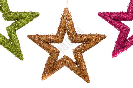 三个圣诞恒星用于树脱色白底隔离在色背景上图片