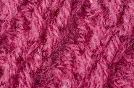 粉色编织的羊毛纹理可以用作背景图片