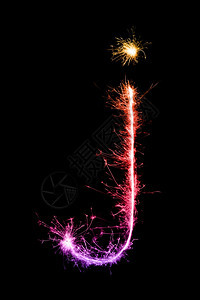 夜间背景的Sparkler烟火灯光字母jSmall字母图片