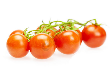 白孤立的多汁西红柿图片