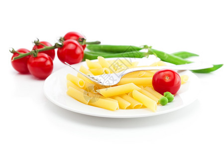 西红柿豌豆面粉和叉子图片