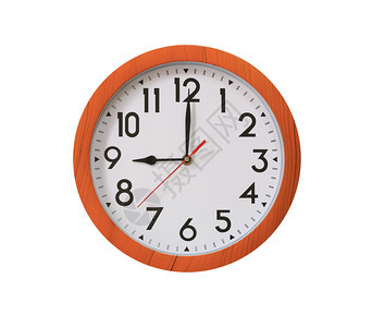 九点钟方向的棕色木头时钟与白面包上隔绝九点钟方向的棕色木头时钟与白色背景隔绝图片