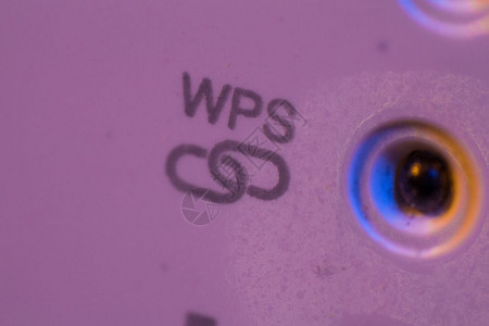WPS符号信连接状态的宏引导光线WiFi转发器设备在墙上的电插座中有助于扩展家庭或办公室的无线网络图片