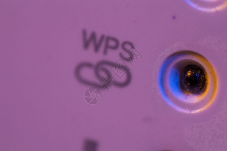 WPS符号信连接状态的宏引导光线WiFi转发器设备在墙上的电插座中有助于扩展家庭或办公室的无线网络图片