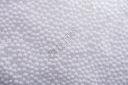 白色微聚苯乙烯泡沫球作为背景背景图片