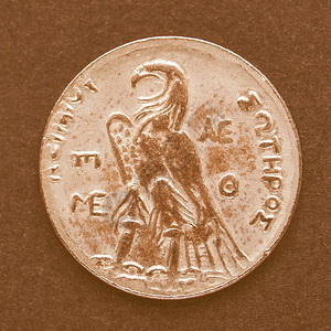 希腊硬币旧年古希腊黑背景的硬币旧年图片