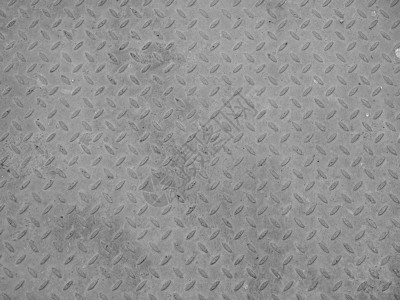 灰色钢菱形板背景用作黑白背景的灰色钢制金刚石板图片