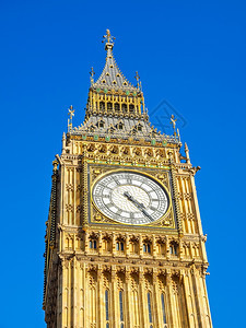 大本钟HDR高动态范围HDR大本钟议会大厦威斯敏斯特宫伦敦哥特式建筑蓝天背景图片