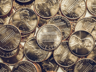 复古美元硬币背景复古的美国美元硬币美国的货币可用作背景图片