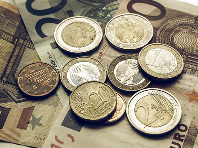 欧元的旧照片钞票和硬币的原始背景图片
