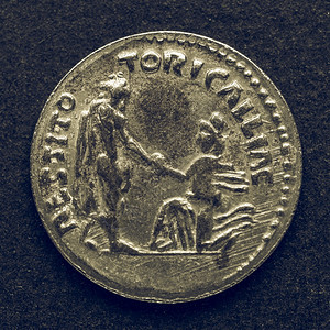 古罗马金币黑色背景的古罗马金币图片