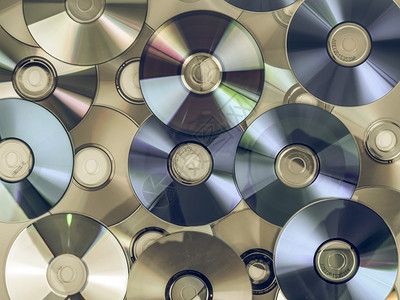 寻找CDDDDDB蓝光盘的旧CDDVDBDBluray光盘用于音乐视频和数据存储图片