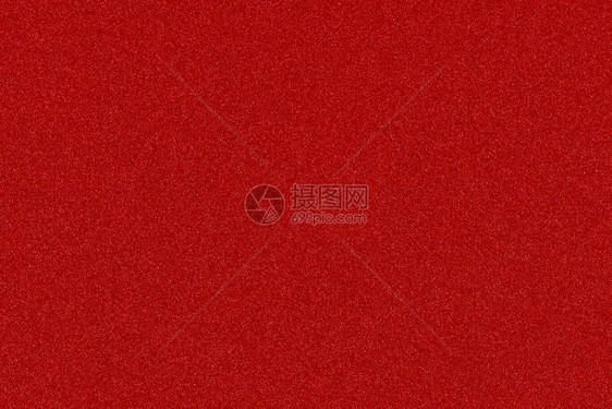 红色纹理和闪亮的随机彩色噪音斑点可作为圣诞节的背景图片