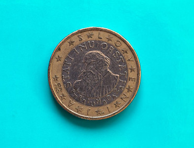 1个欧元硬币洲联盟斯洛文尼亚超过绿色蓝1个欧元硬币洲联盟货币斯洛文尼亚超过绿色蓝背景图片