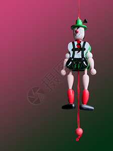小丑玩偶粉色背景退化的奥地利傀儡背景