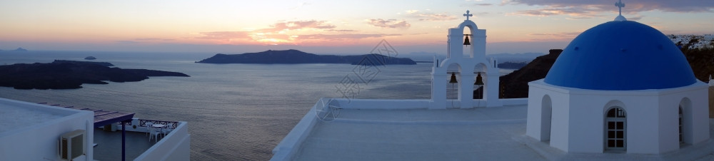 希腊圣托里尼教堂日落美景图片
