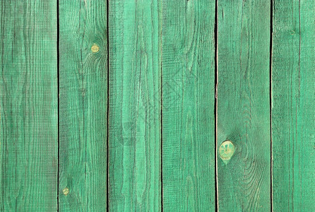涂有绿色的木围栏图片