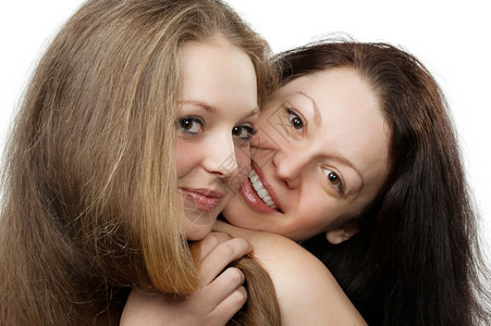 两个姐妹年轻迷人女孩的肖像图片