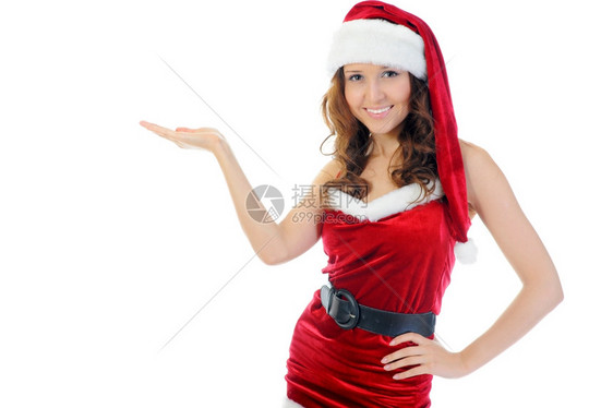 圣诞微笑的女士穿着红色圣塔帽孤立在白色背景上图片
