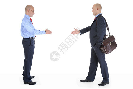 两名商人伸出双手握图片