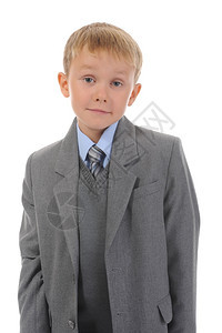 身穿商业西装的小男孩孤立于白种背景图片